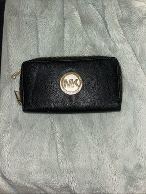 Michael Kors Black Pebbled Leather Zip-Around Wallet with Gold MK Emblem